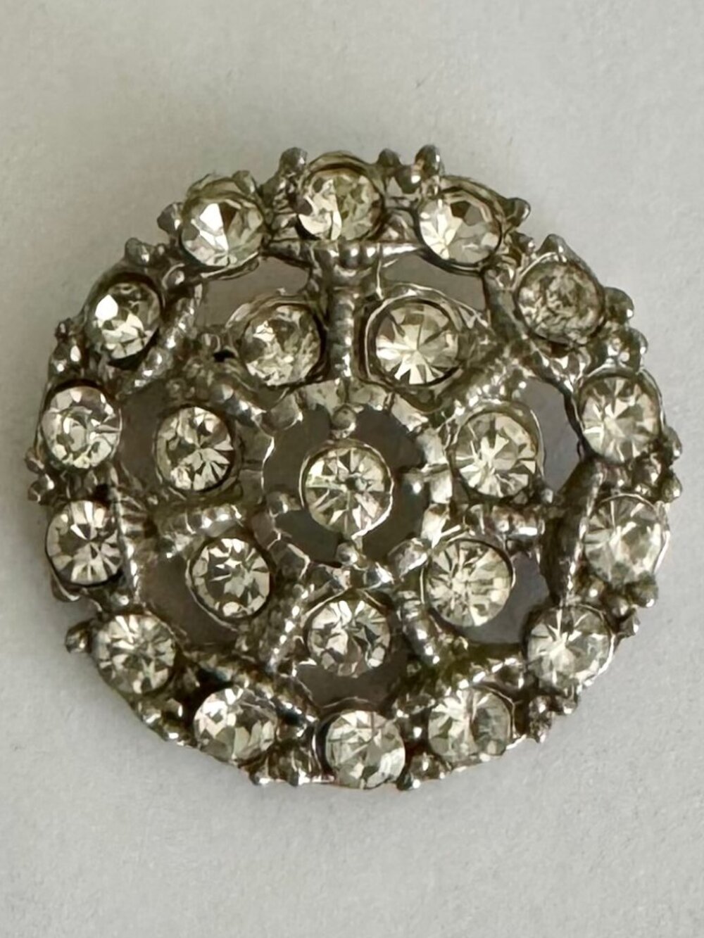 Vintage Clear Rhinestone Round Brooch Silver Tone Openwork Prong Set
